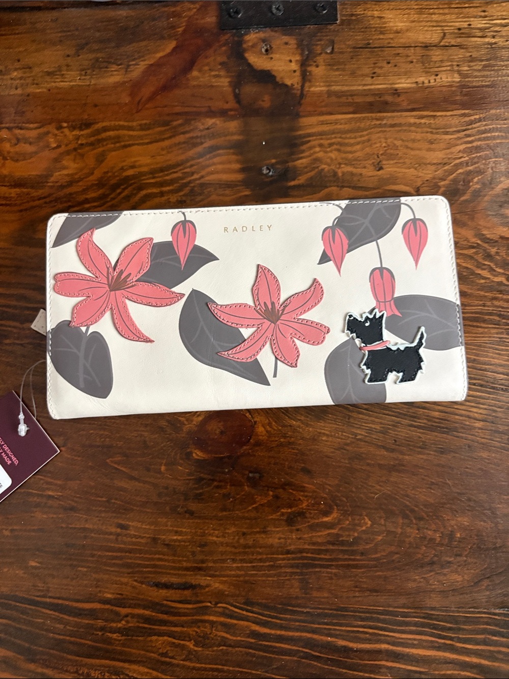 RADLEY LONDON open white pretty petal large bifold wallet.